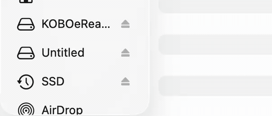 In the Finder sidebar, the eject button beside KOBOeReader is clicked and the drive disappears from the list.