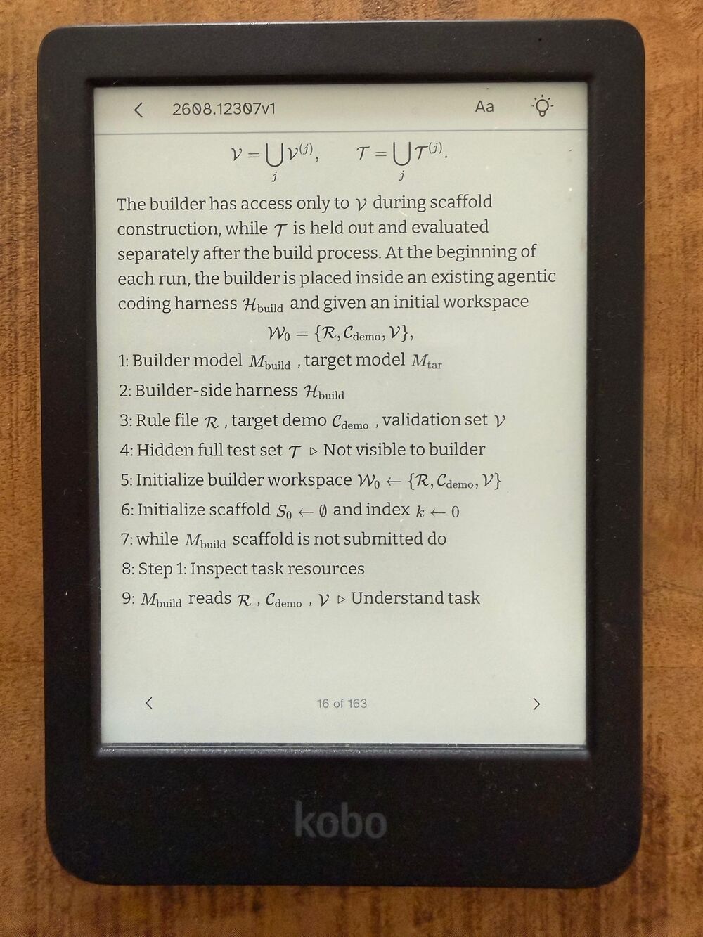 Mathematical notation and a numbered algorithm from an arXiv paper on a Kobo e-reader
