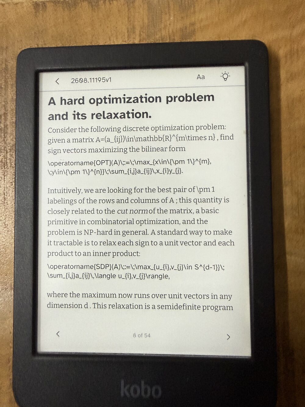 An arXiv preprint section titled 'A hard optimization problem and its relaxation' rendered on a Kobo Clara BW